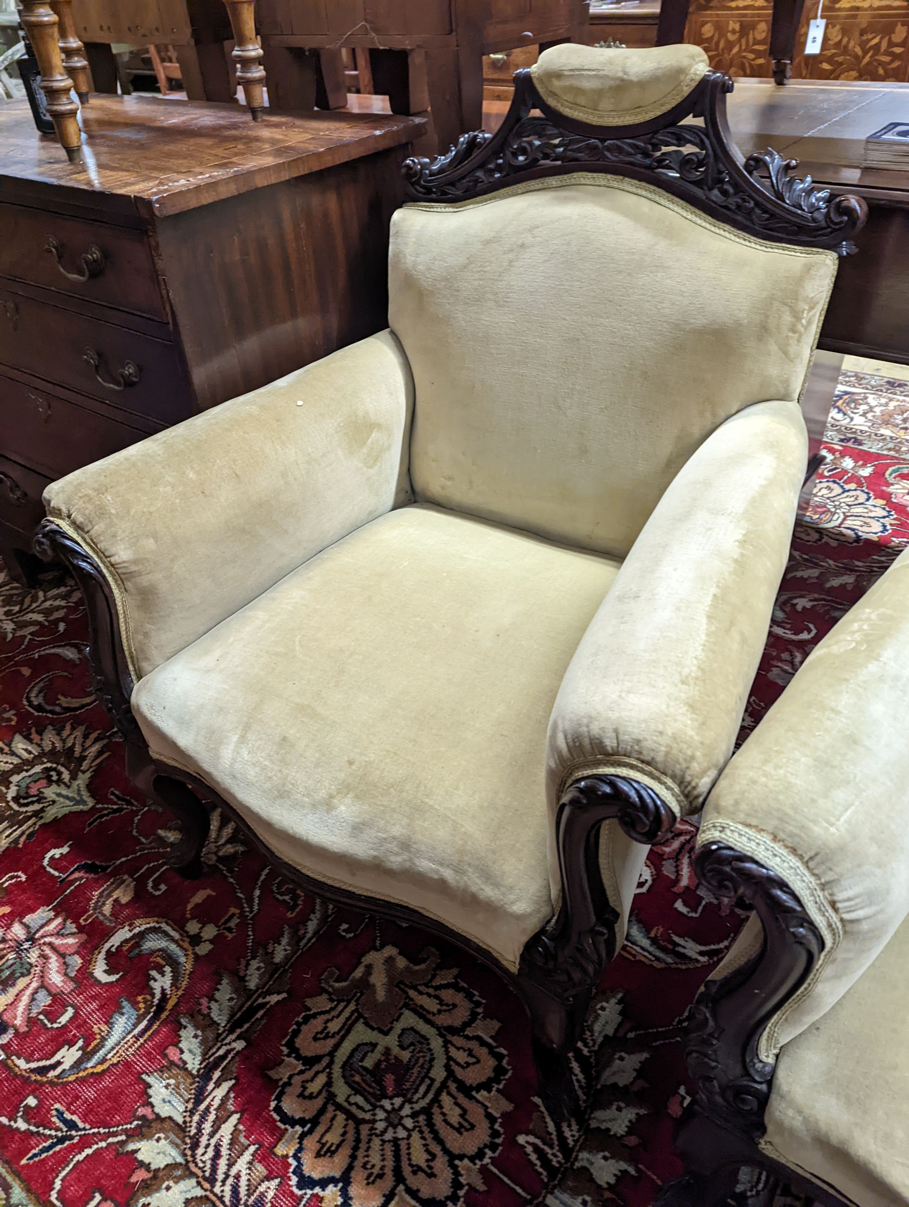 A late Victorian carved mahogany seven piece salon suite, settee length 140cm, depth 60cm, height 94cm